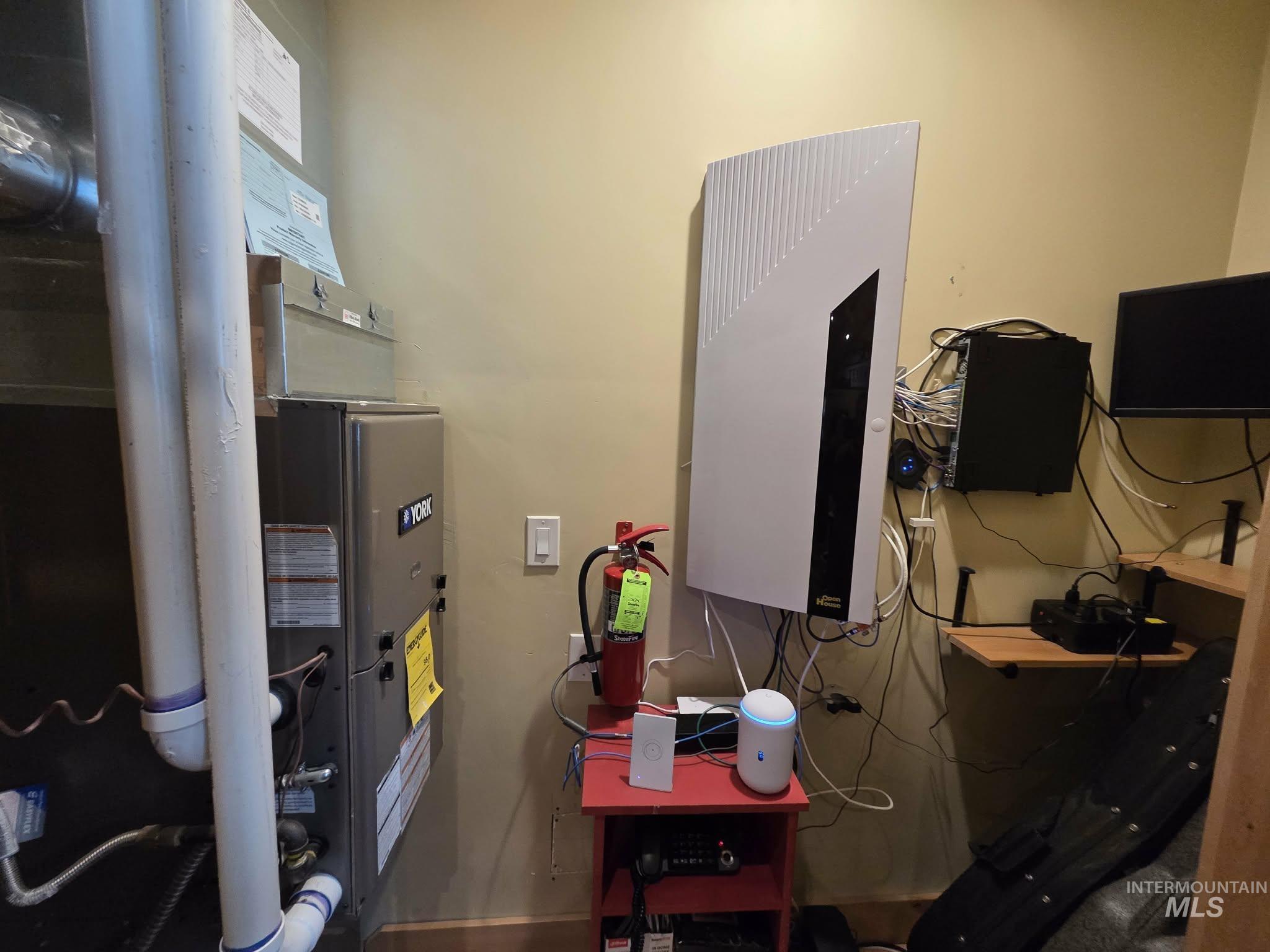 36 Kevins Way Garden Valley, ID 83622 - Photo 36 of 50 Utility room featuring heating unit