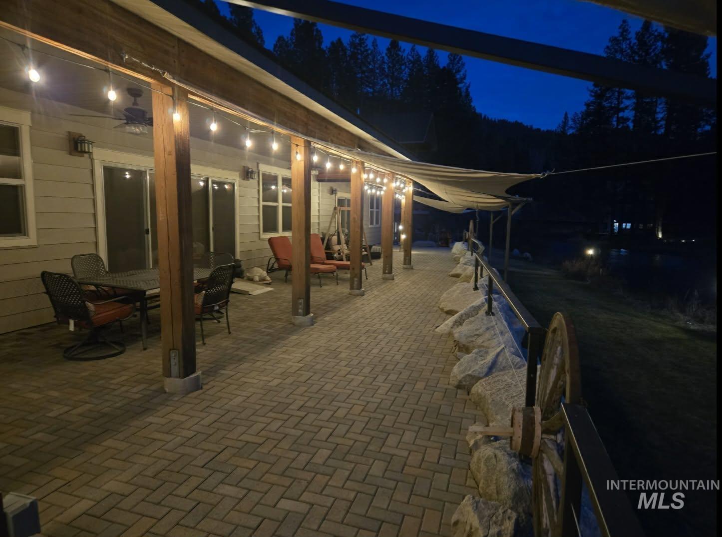 36 Kevins Way Garden Valley, ID 83622 - Photo 40 of 50 Patio at night featuring a patio area and outdoor dining area