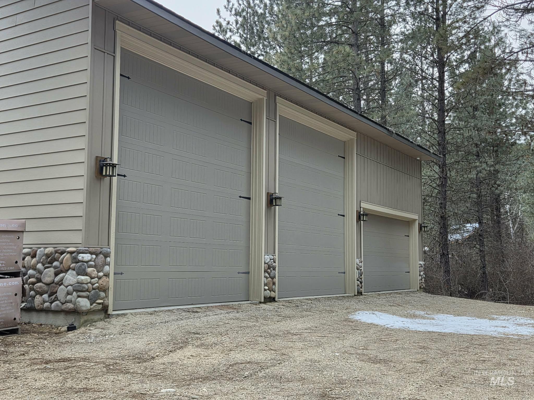36 Kevins Way Garden Valley, ID 83622 - Photo 9 of 50 Garage featuring driveway