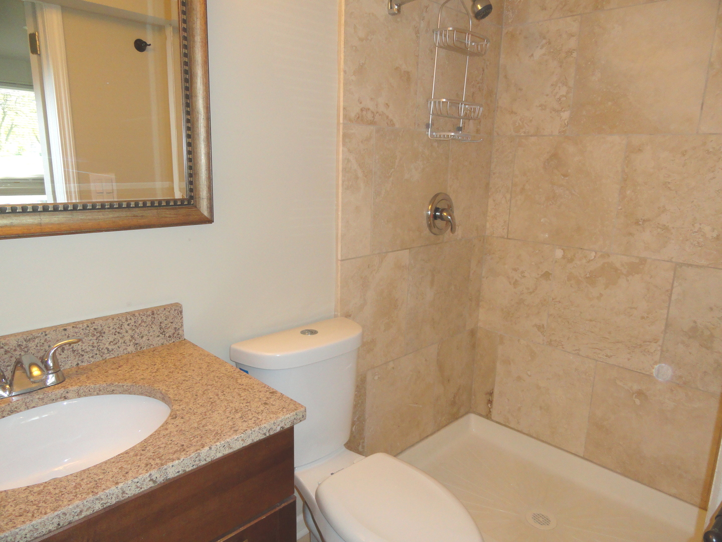 596 Maple Avenue Lisle, IL 60532 - Photo 16 of 21 a bathroom with a granite countertop sink toilet and shower