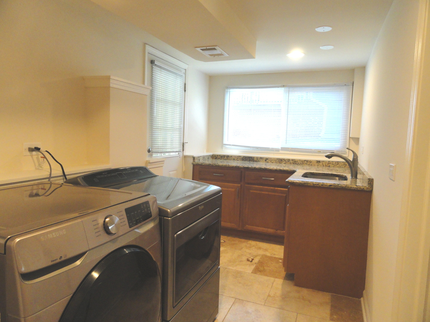 596 Maple Avenue Lisle, IL 60532 - Photo 18 of 21 a utility room with washer and dryer