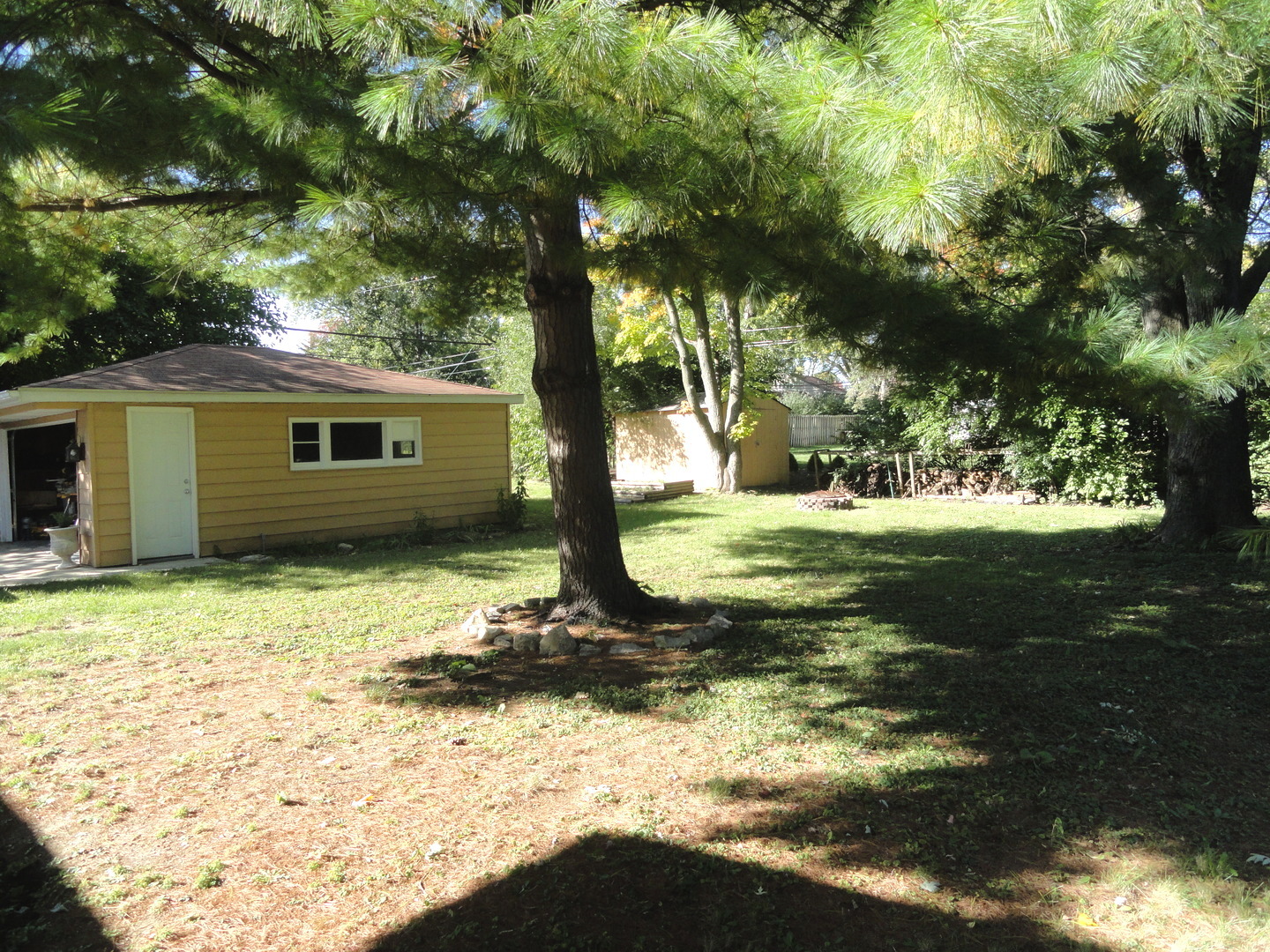 596 Maple Avenue Lisle, IL 60532 - Photo 20 of 21 a view of a house with a yard