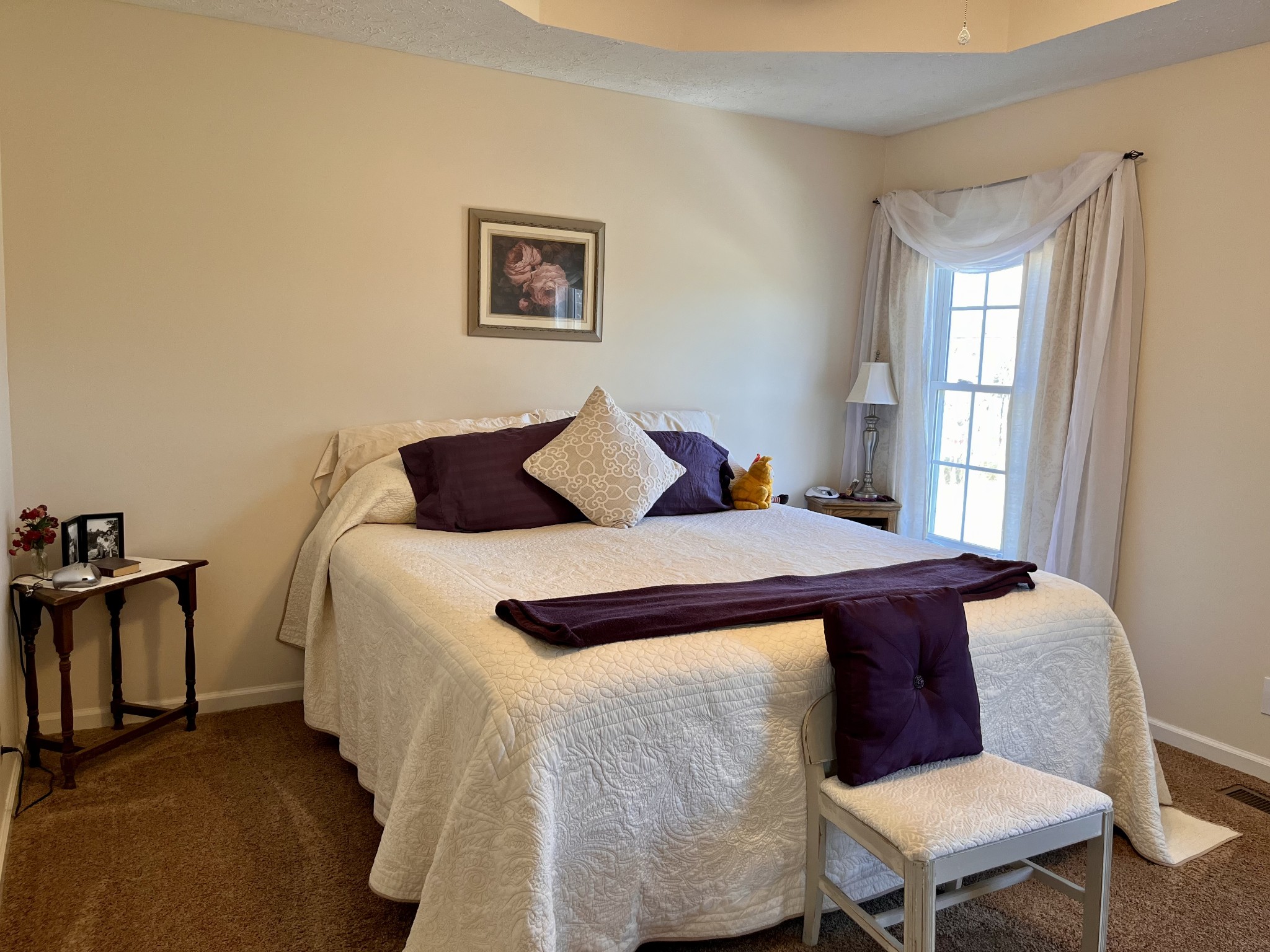 4869 Starks Road Cross Plains, TN 37049 - Photo 29 of 46 a bedroom with a bed two lamps and a large window