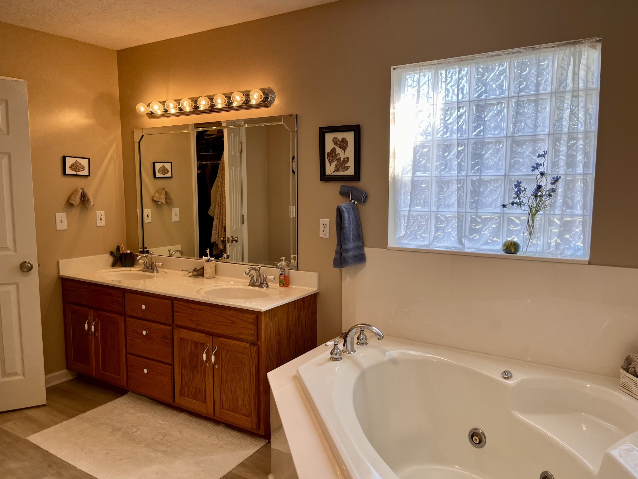 4869 Starks Road Cross Plains, TN 37049 - Photo 32 of 46 a bathroom with a tub sink and mirror