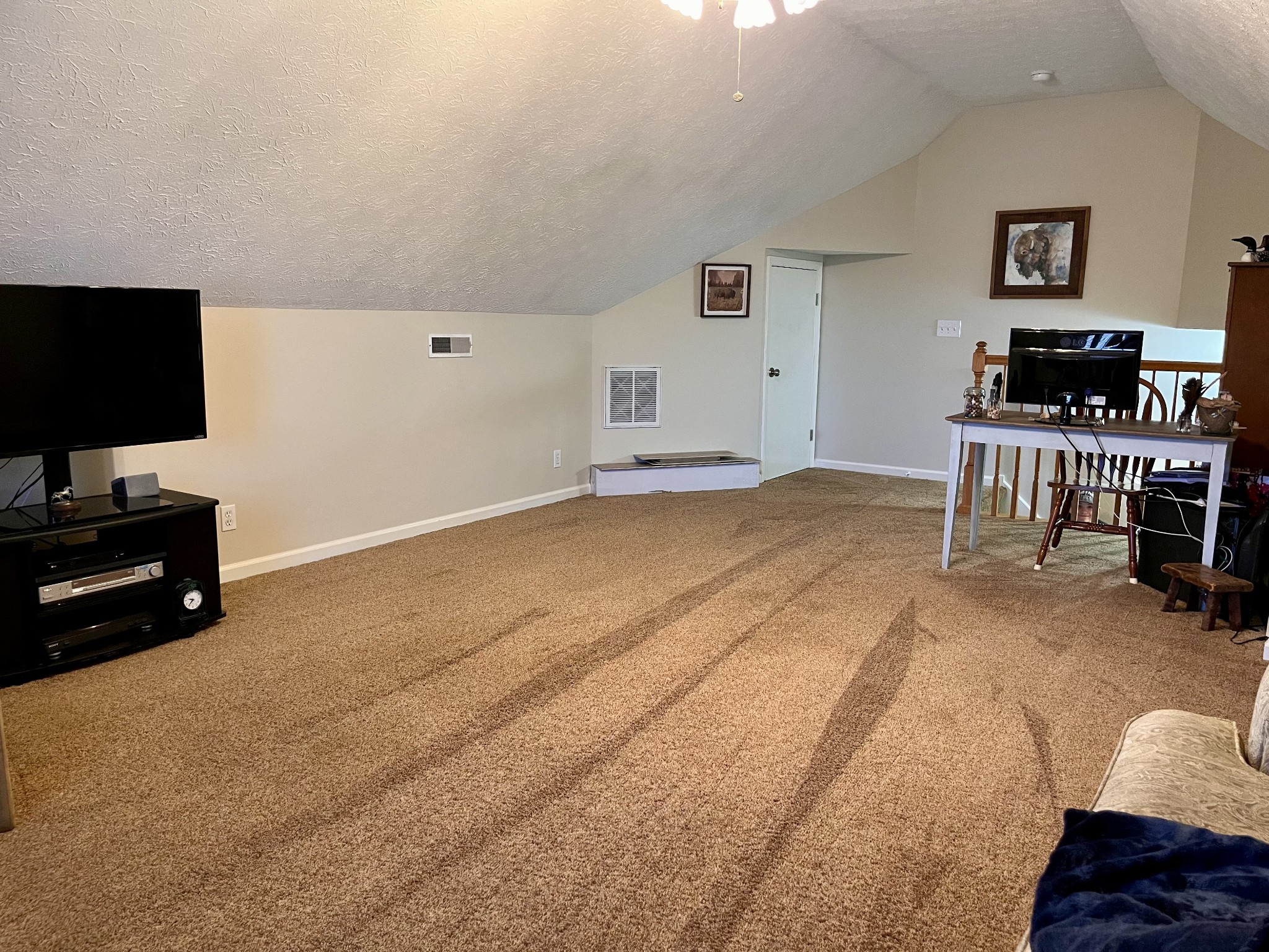 4869 Starks Road Cross Plains, TN 37049 - Photo 36 of 46 a living room with furniture and a flat screen tv