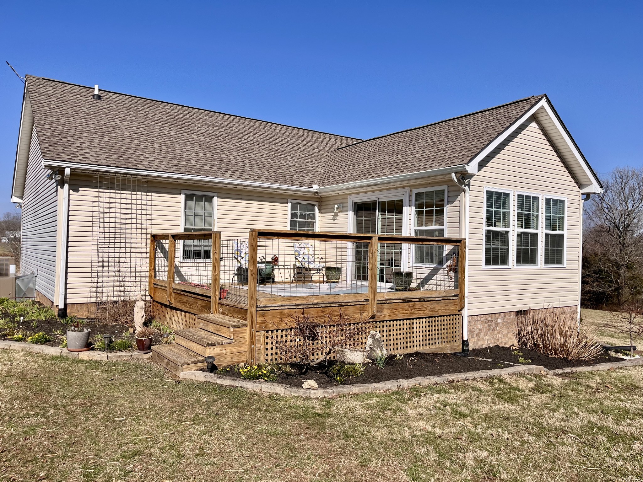 4869 Starks Road Cross Plains, TN 37049 - Photo 39 of 46 a front view of a house with a yard