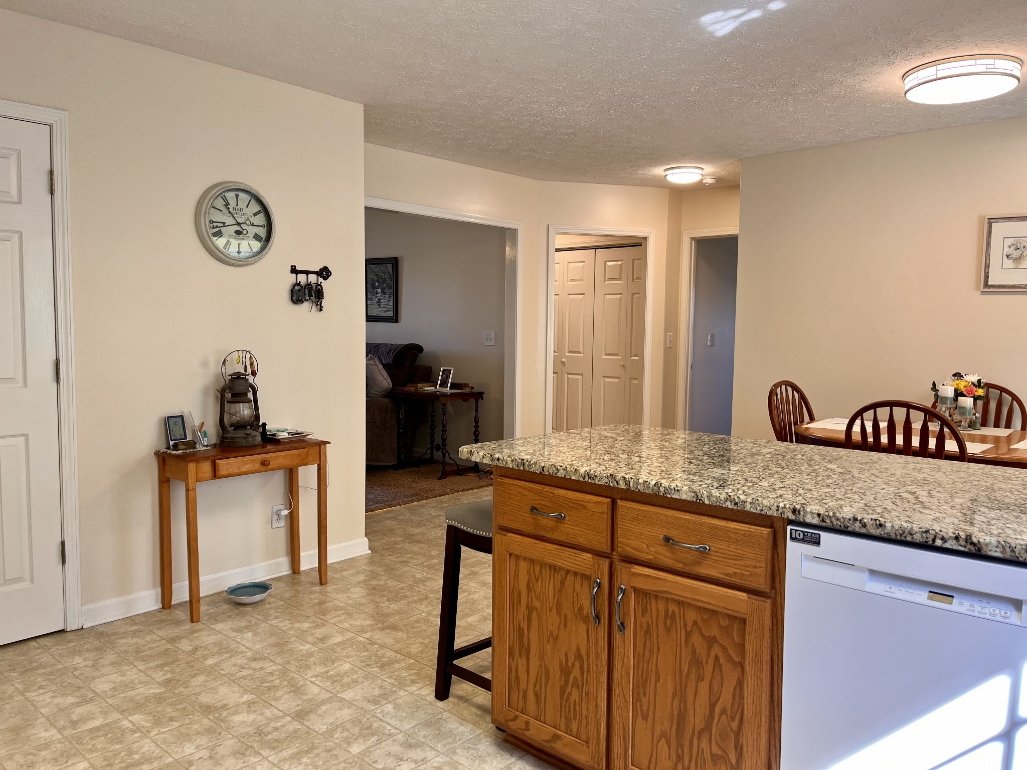 4869 Starks Road Cross Plains, TN 37049 - Photo 7 of 46 a kitchen with granite countertop a sink and a stove