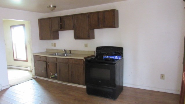161 5th Avenue Sharon, PA 16146 - Photo 4 of 17 a kitchen with a stove and a microwave