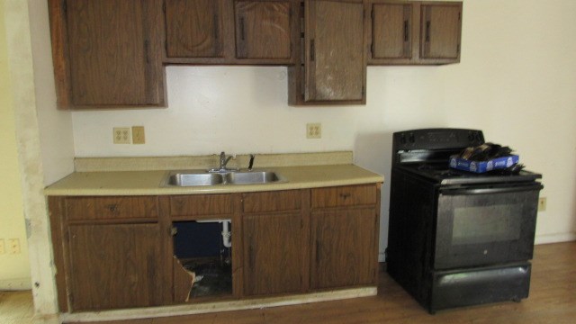 161 5th Avenue Sharon, PA 16146 - Photo 7 of 17 a kitchen with sink a microwave and cabinets
