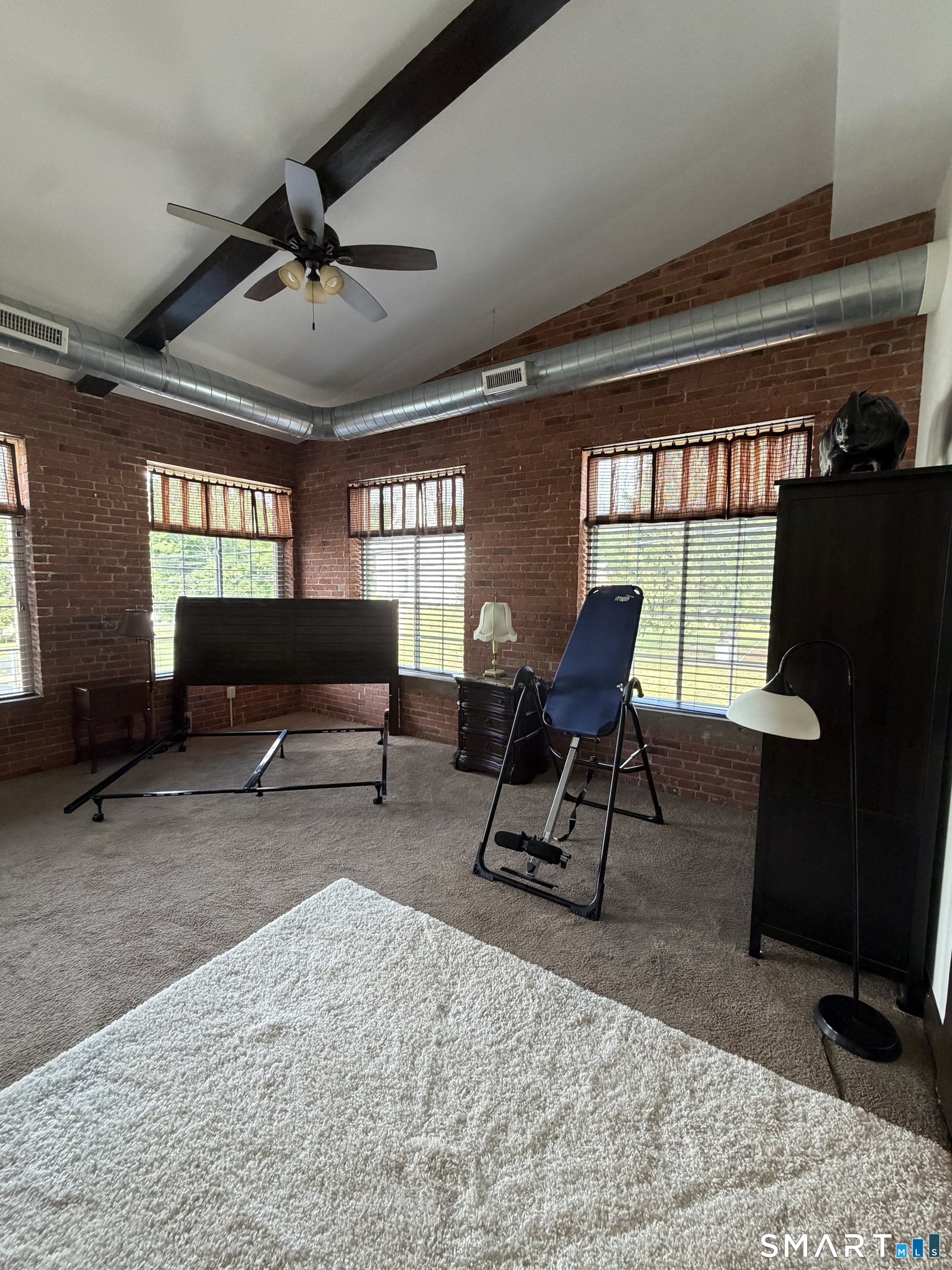 10 Summit Street, Unit 1 East Hampton, CT 06424 - Photo 7 of 14 a living room with furniture and a rug