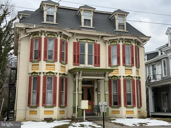front view of a building with a street