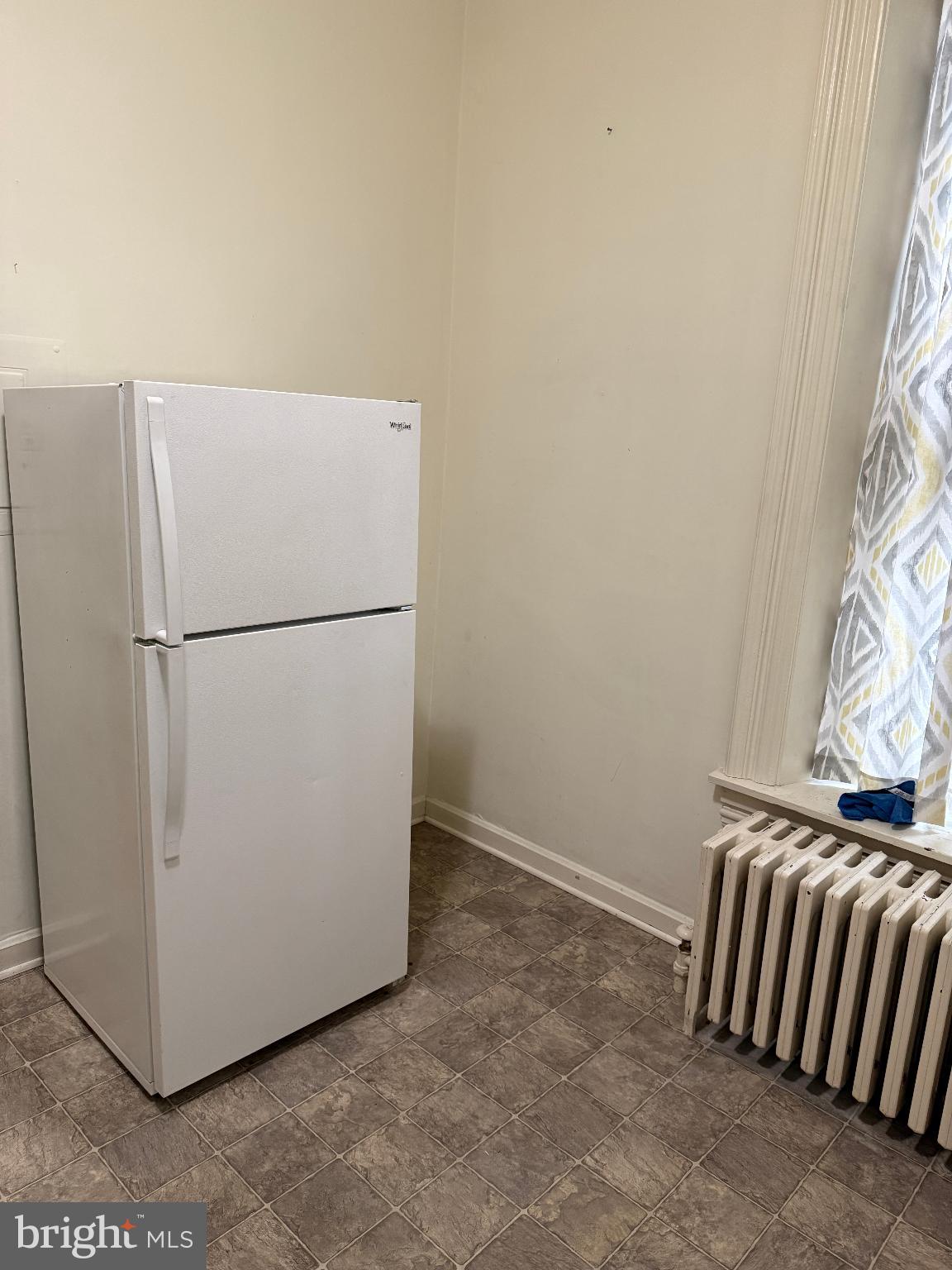 232 West Main Street, Unit 4 Waynesboro, PA 17268 - Photo 12 of 12 a view of utility room with refrigerator and windows