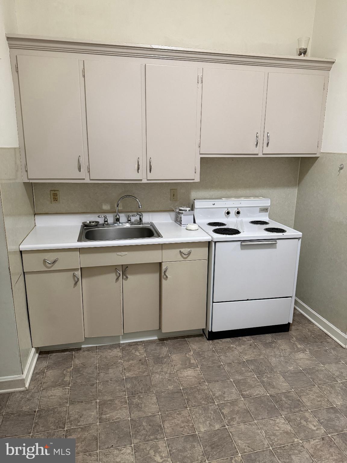 232 West Main Street, Unit 4 Waynesboro, PA 17268 - Photo 7 of 12 a utility room with cabinets washer and dryer