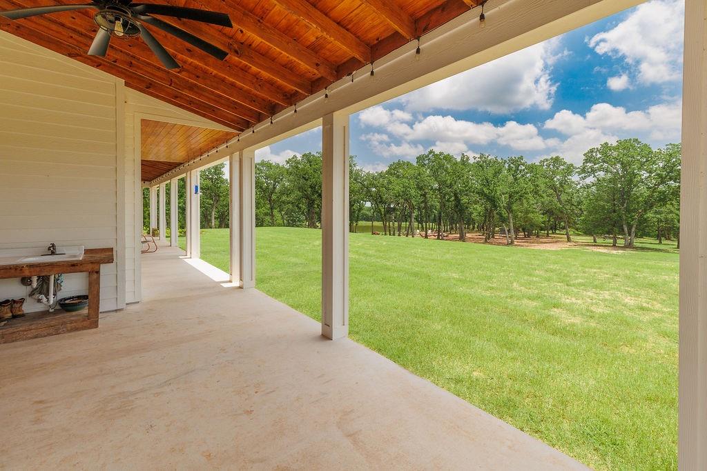 2094 Jim Harry Loop Sunset, TX 76270 - Photo 28 of 40 wrap around porch with outdoor sink