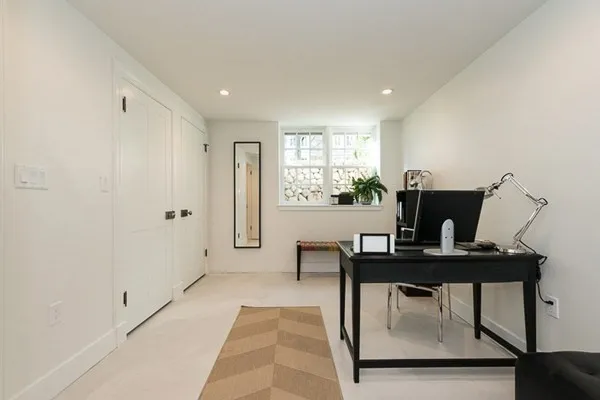 a view of a workspace with furniture