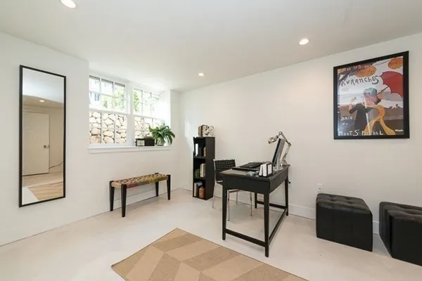 a view of a livingroom with furniture and a piano