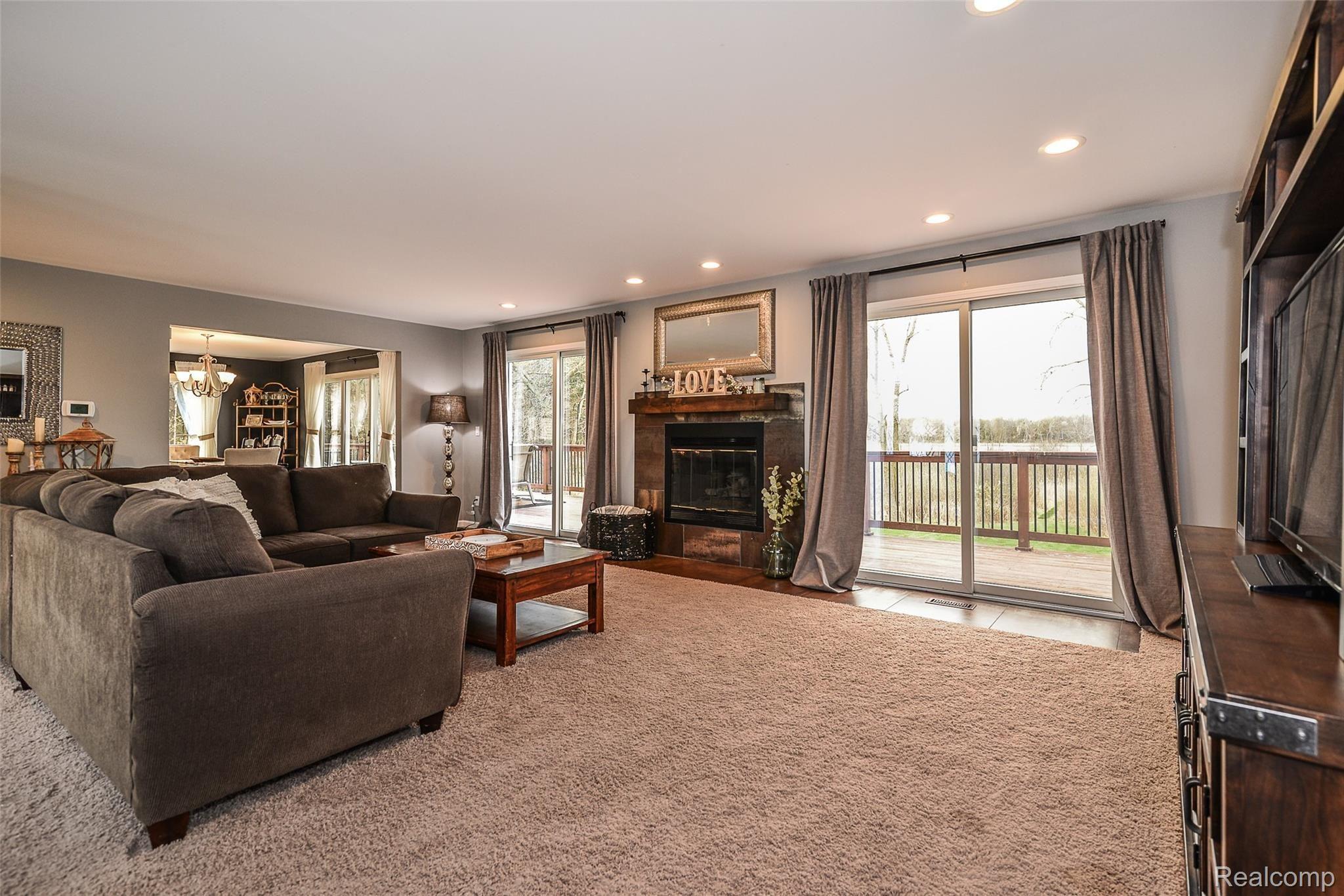 4184 Bauer Road Brighton, MI 48116 - Photo 6 of 51 Large Great Room with Dual Sliding Door to Beautiful Scenic Backyard
