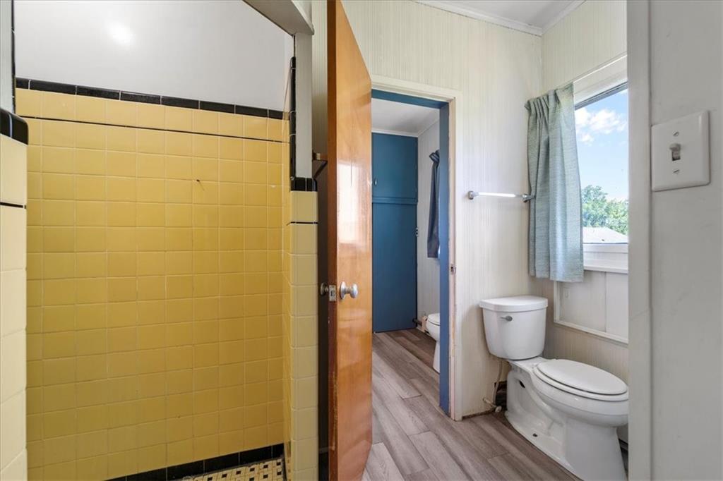 1143 Altman Road Jeannette, PA 15644 - Photo 15 of 50 a bathroom with a toilet and a shower
