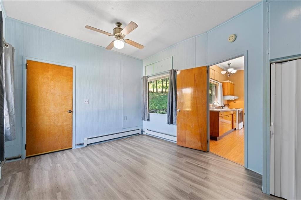 1143 Altman Road Jeannette, PA 15644 - Photo 19 of 50 a view of an entryway with wooden floor