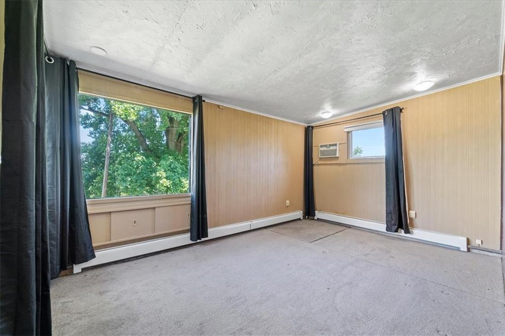 1143 Altman Road Jeannette, PA 15644 - Photo 9 of 50 a view of an empty room with a window