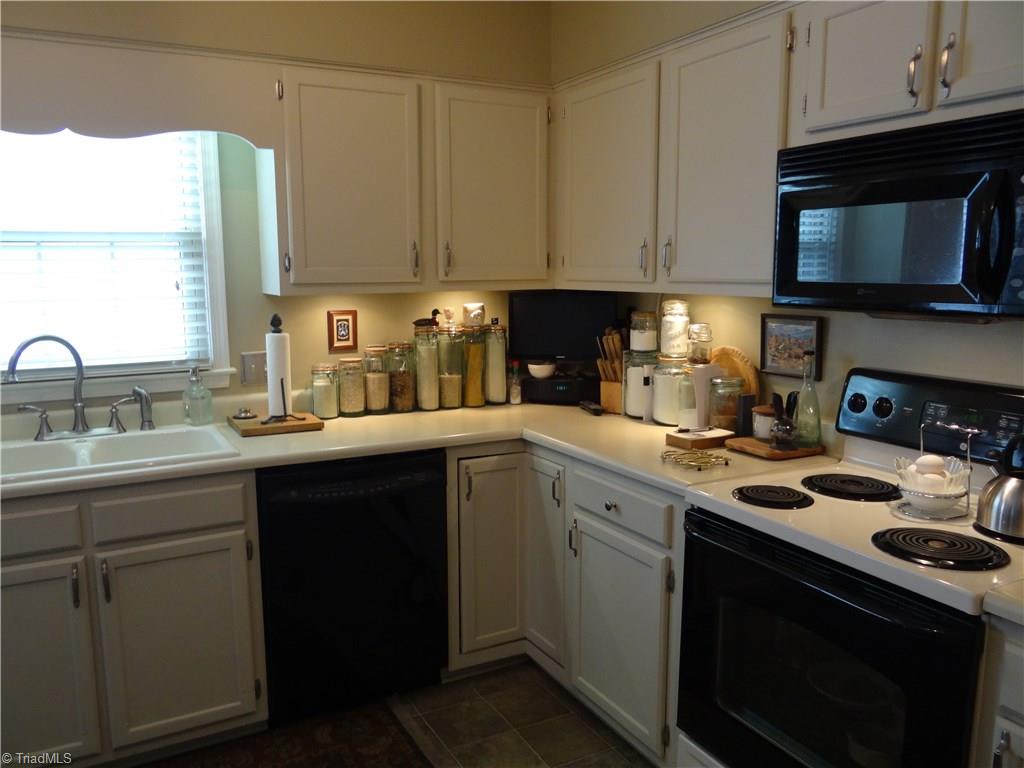 2207 Acorn Ridge Road Greensboro, NC 27407 - Photo 2 of 18 Large kitchen with freshly painted cabinets