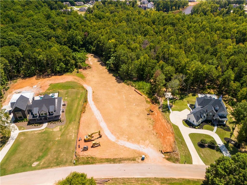 642 Canter Way Jefferson, GA 30549 - Photo 3 of 7 a view of swimming pool with sitting area