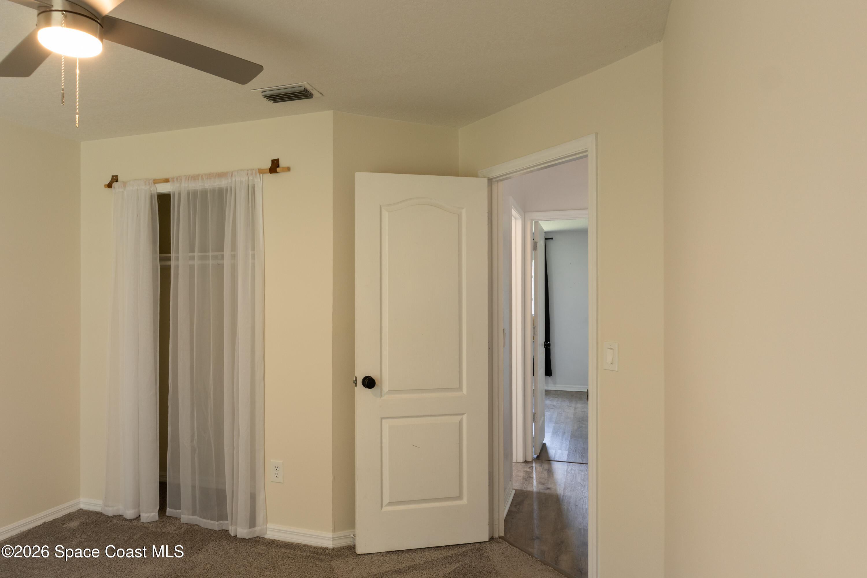 1572 Holbrook Road Northwest Palm Bay, FL 32907 - Photo 13 of 38 a view of elevator with hallway