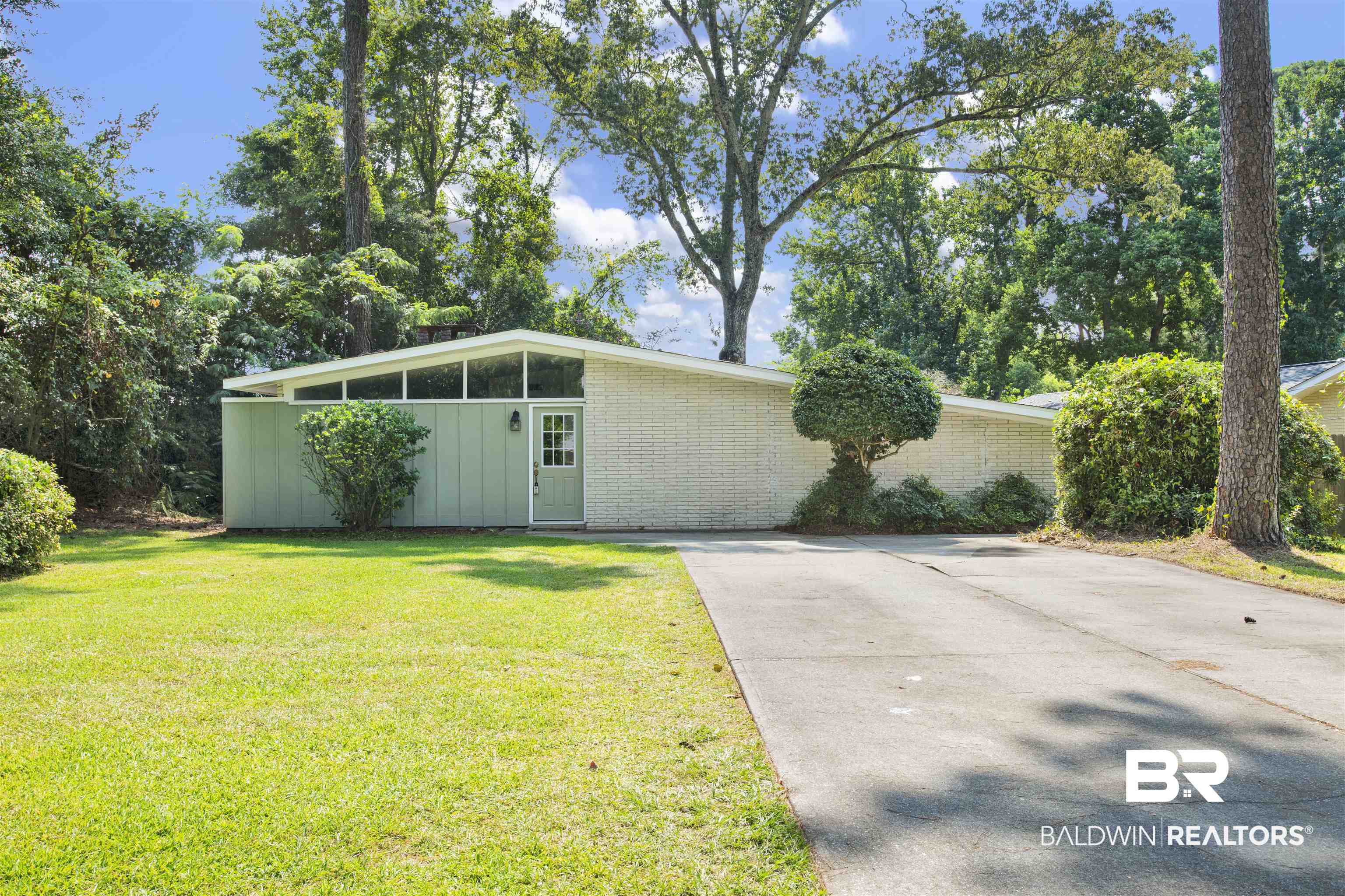 2 Lee Circle Daphne, AL 36527 - Photo 1 of 21 View of front of home featuring a front lawn