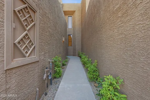 a front view of a house with barbeque area