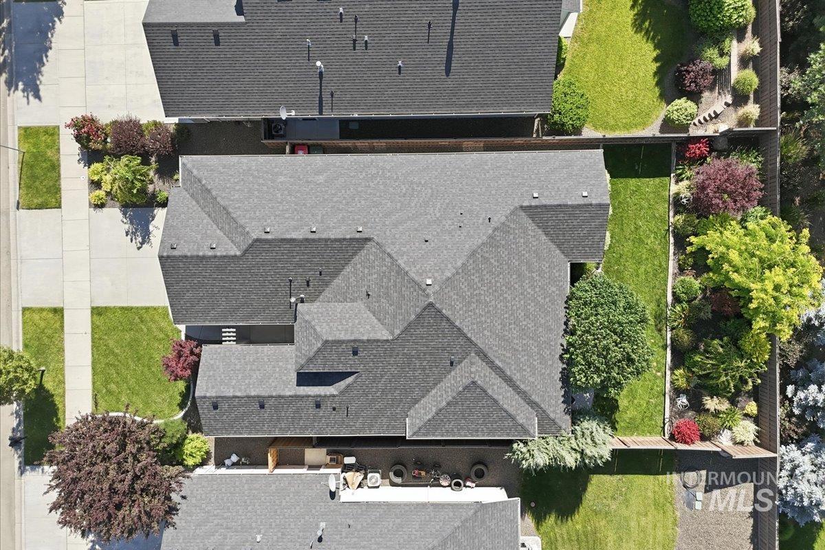 1303 West Brando Street Meridian, ID 83646 - Photo 39 of 49 Aerial view of property featuring a multi-gabled roofline with dark gray shingles