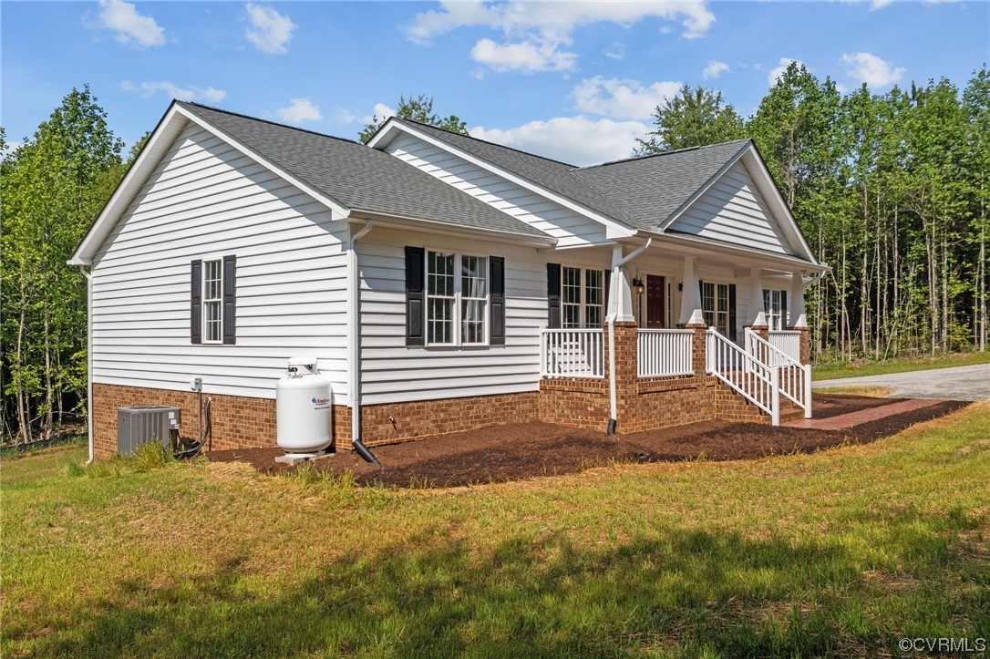 2373 Sheppard Town Road Maidens, VA 23102 - Photo 3 of 42 front view of a house with a yard