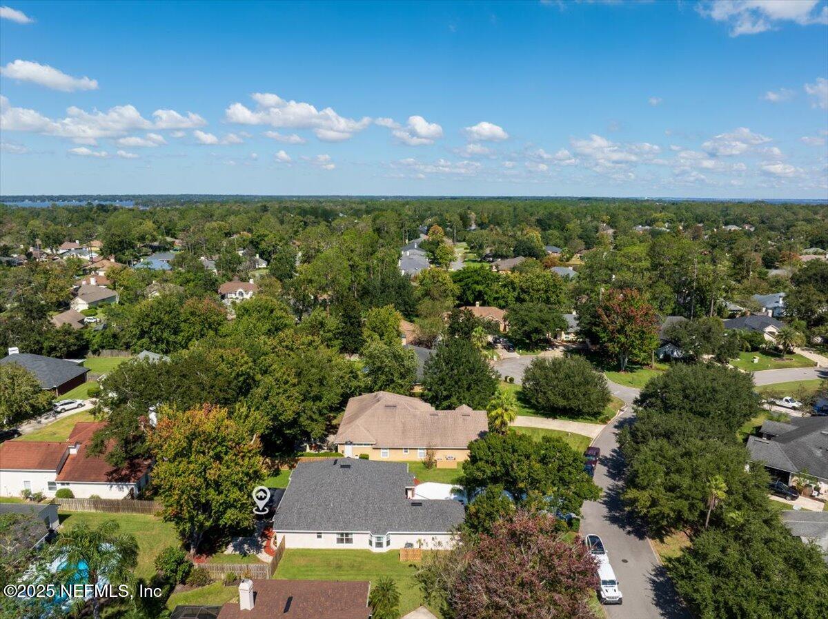 1940 Bluebonnet Way Fleming Island, FL 32003 - Photo 35 of 44 an aerial view of a houses with a yard