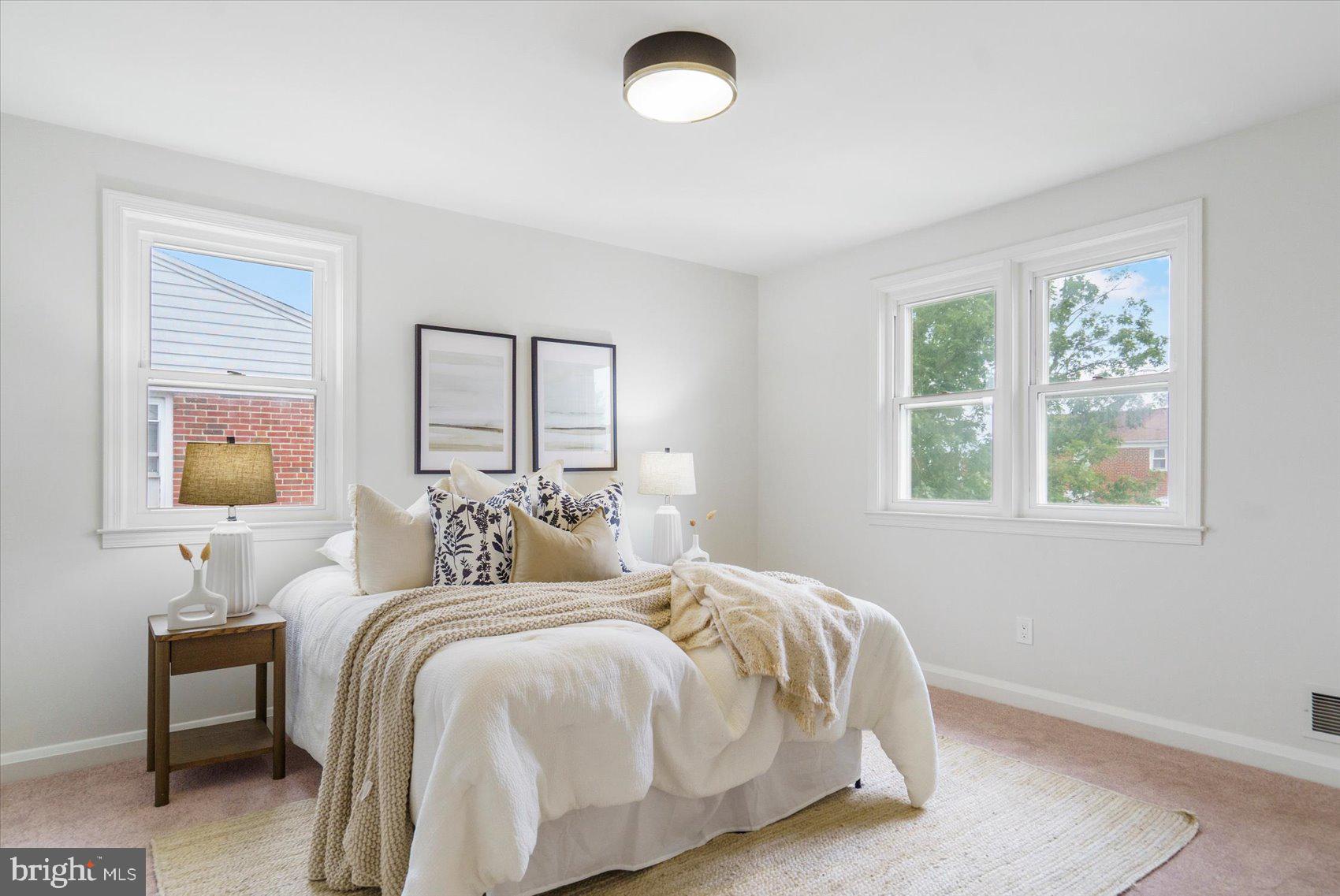 2210 Walshire Avenue Baltimore, MD 21214 - Photo 20 of 42 a bedroom with bed and a window