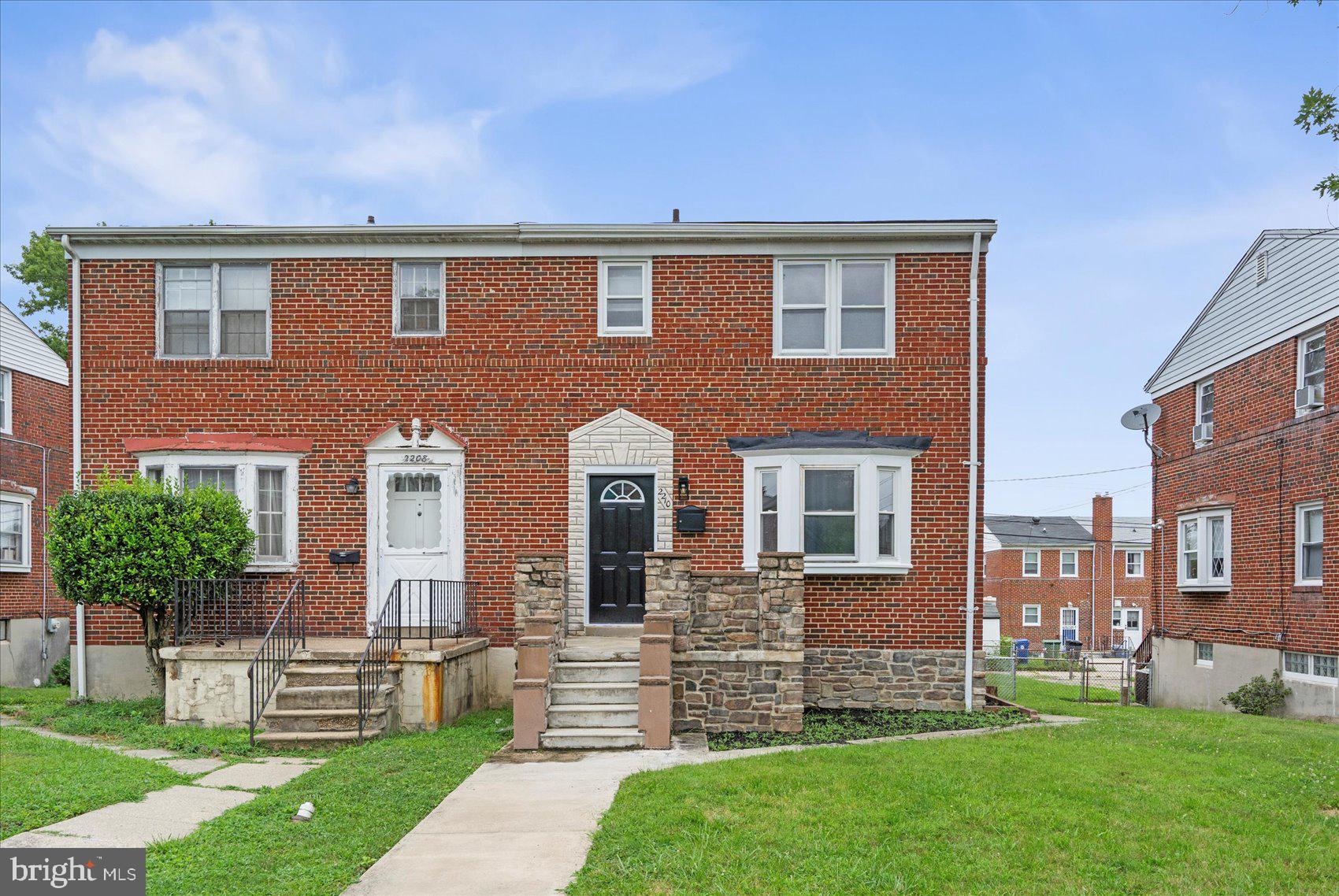 2210 Walshire Avenue Baltimore, MD 21214 - Photo 2 of 42 a front view of a house with garden