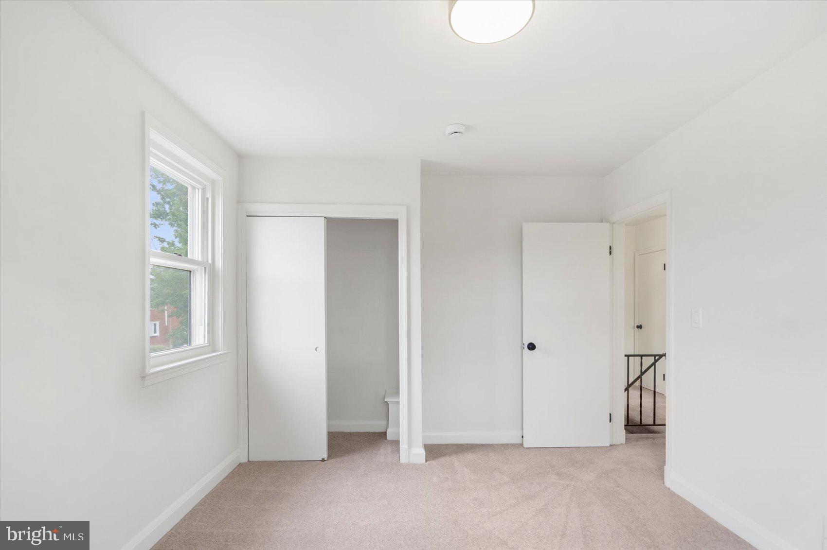 2210 Walshire Avenue Baltimore, MD 21214 - Photo 31 of 42 an empty room with windows