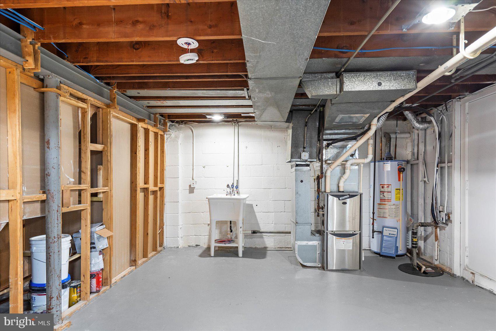 2210 Walshire Avenue Baltimore, MD 21214 - Photo 37 of 42 a view of an empty room with wooden walls