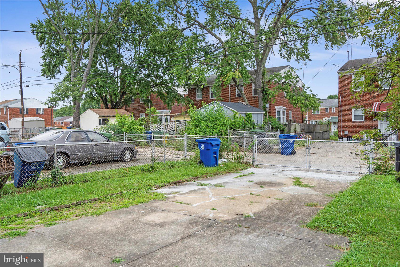 2210 Walshire Avenue Baltimore, MD 21214 - Photo 40 of 42 a view of a park with bench and trees