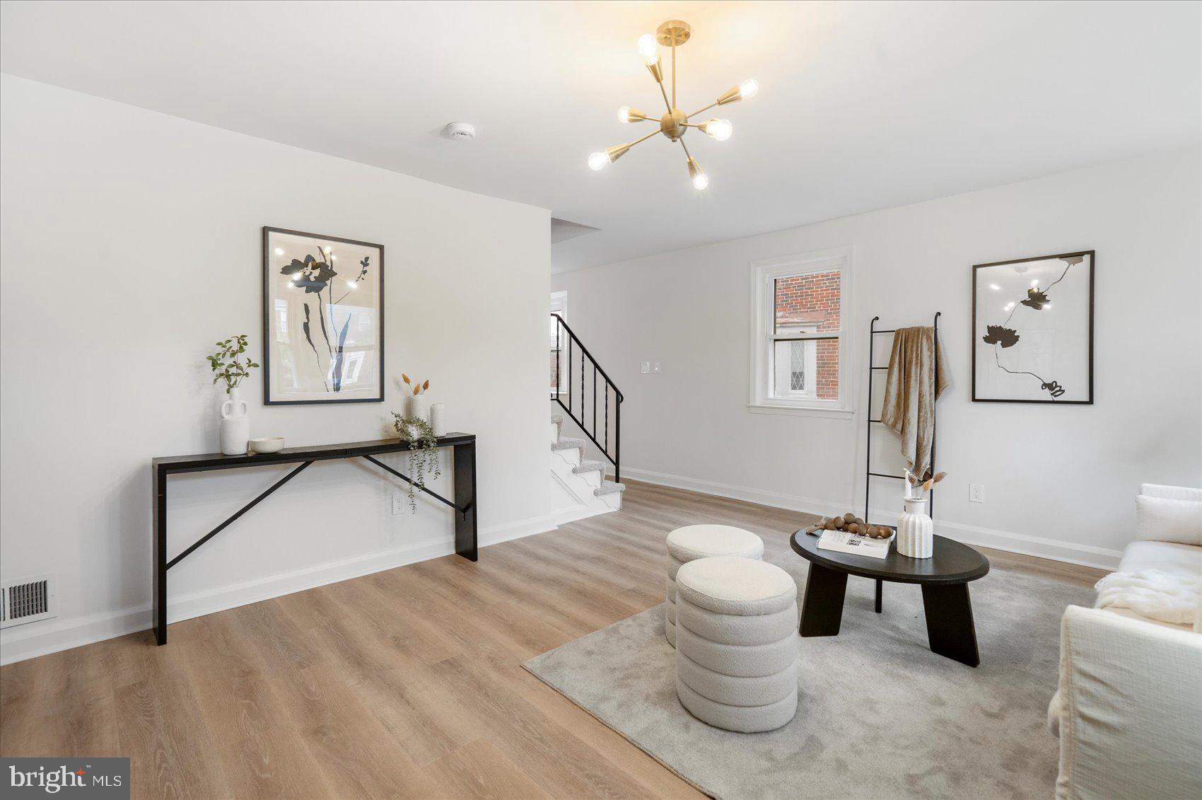 2210 Walshire Avenue Baltimore, MD 21214 - Photo 7 of 42 a living room with furniture and a table