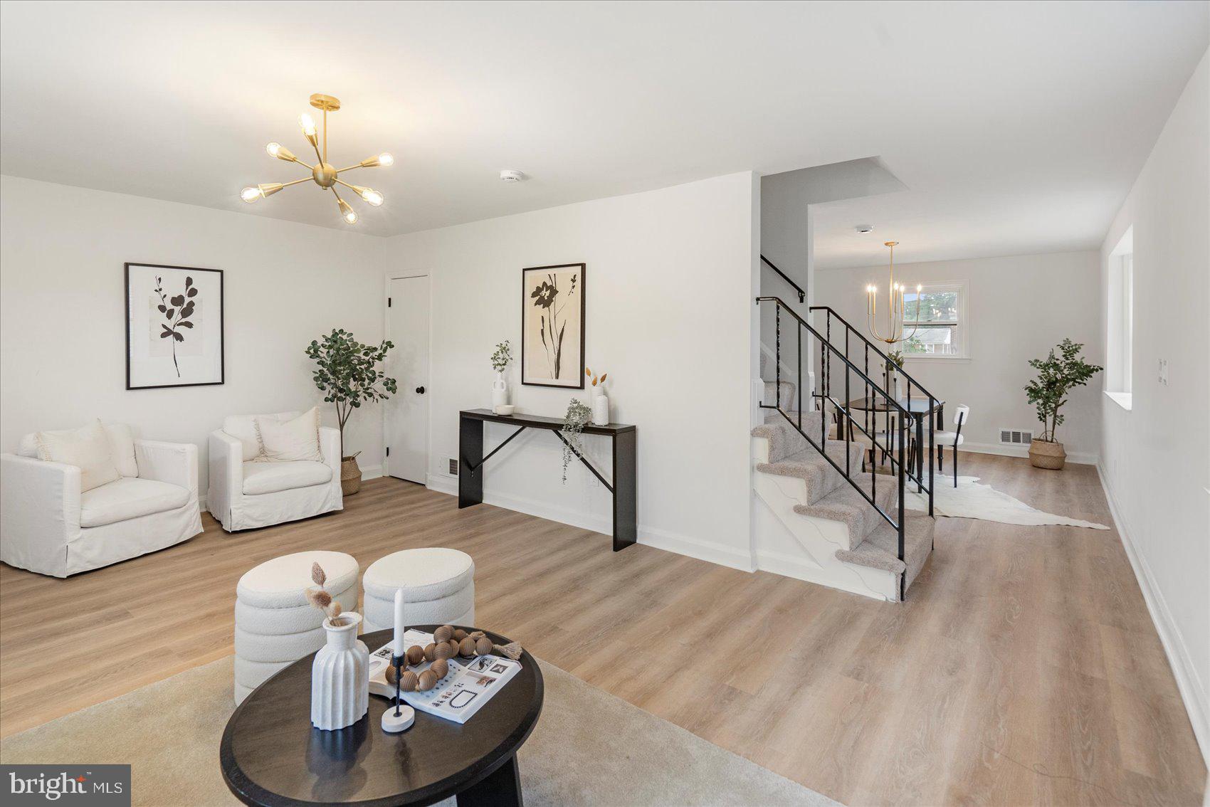2210 Walshire Avenue Baltimore, MD 21214 - Photo 10 of 42 a living room with furniture and a wooden floor