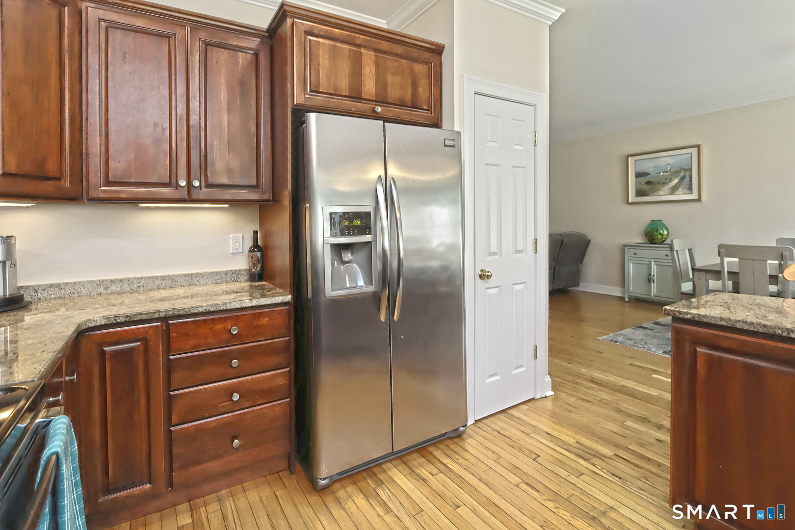 102 Lantern Court, Unit 102 Clinton, CT 06413 - Photo 16 of 36 a kitchen with stainless steel appliances granite countertop a refrigerator and a stove