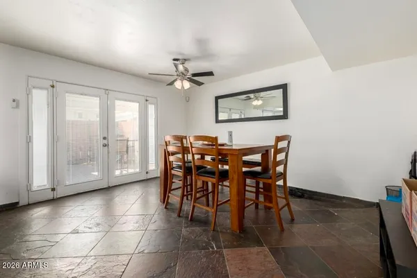 a view of a dining room with furniture