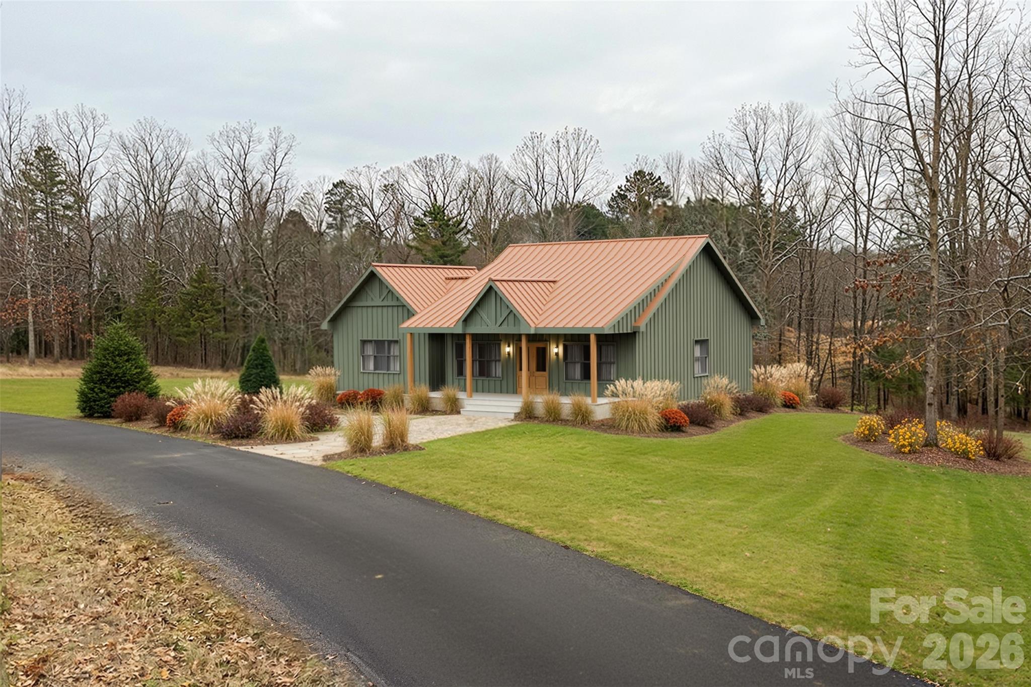 0 Freemantown Road Rutherfordton, NC 28139 - Photo 2 of 7 a view of a house with garden and sitting area