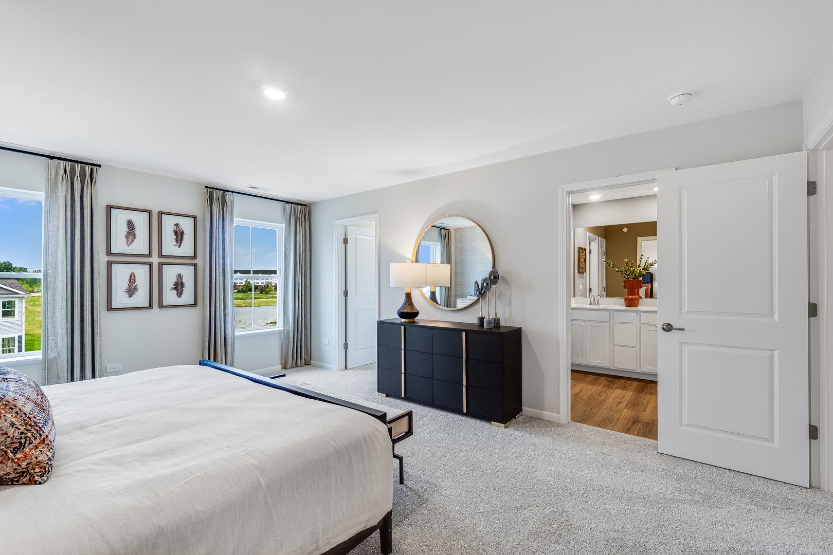 408 Red Oak Circle Volo, IL 60020 - Photo 11 of 19 a bedroom with a bed and dresser