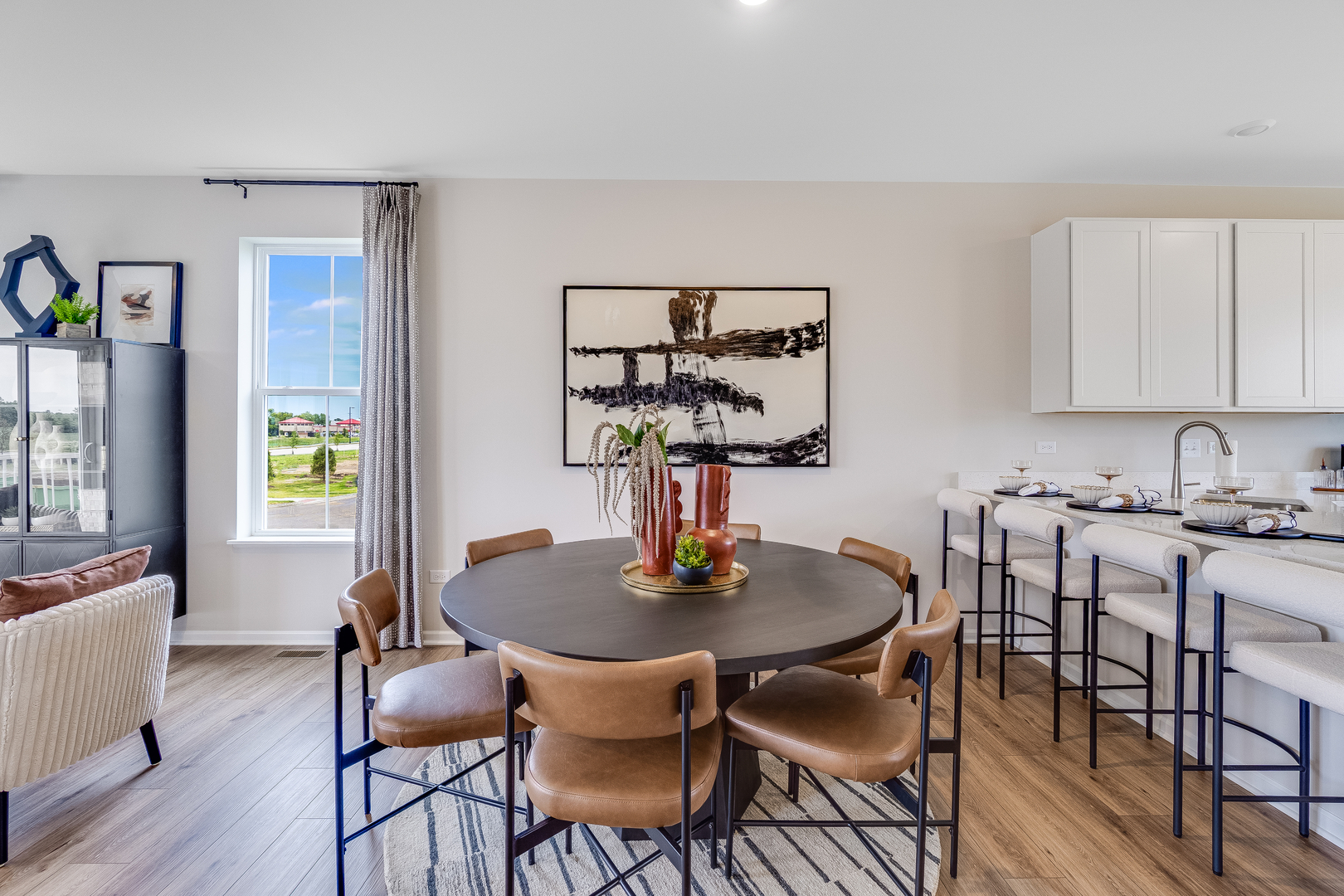 408 Red Oak Circle Volo, IL 60020 - Photo 7 of 19 a view of a dining room with furniture and wooden floor