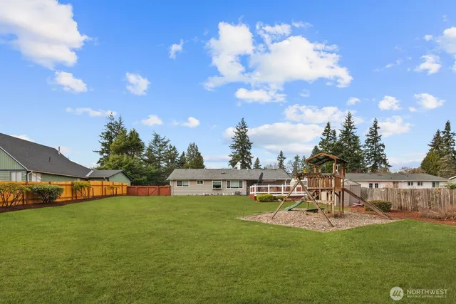 a view of a house with a big yard