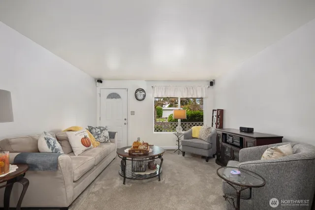 a living room with furniture and a couch