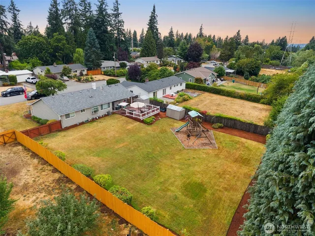 a view of swimming pool with chairs