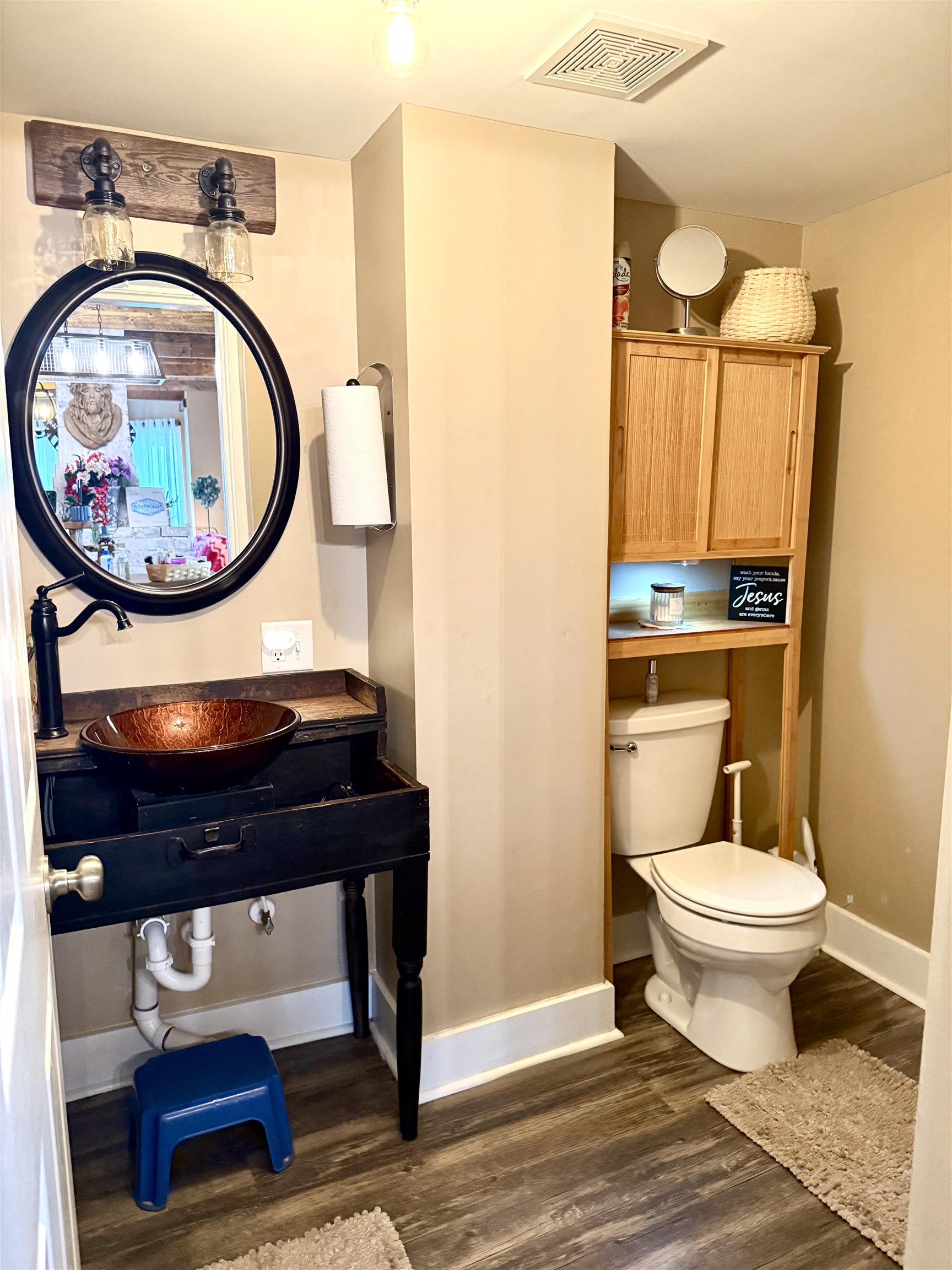 15385 Evergreen Valley Road Timberville, VA 22853 - Photo 11 of 44 a bathroom with a toilet a sink and a mirror