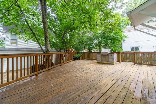 a balcony with wooden floor