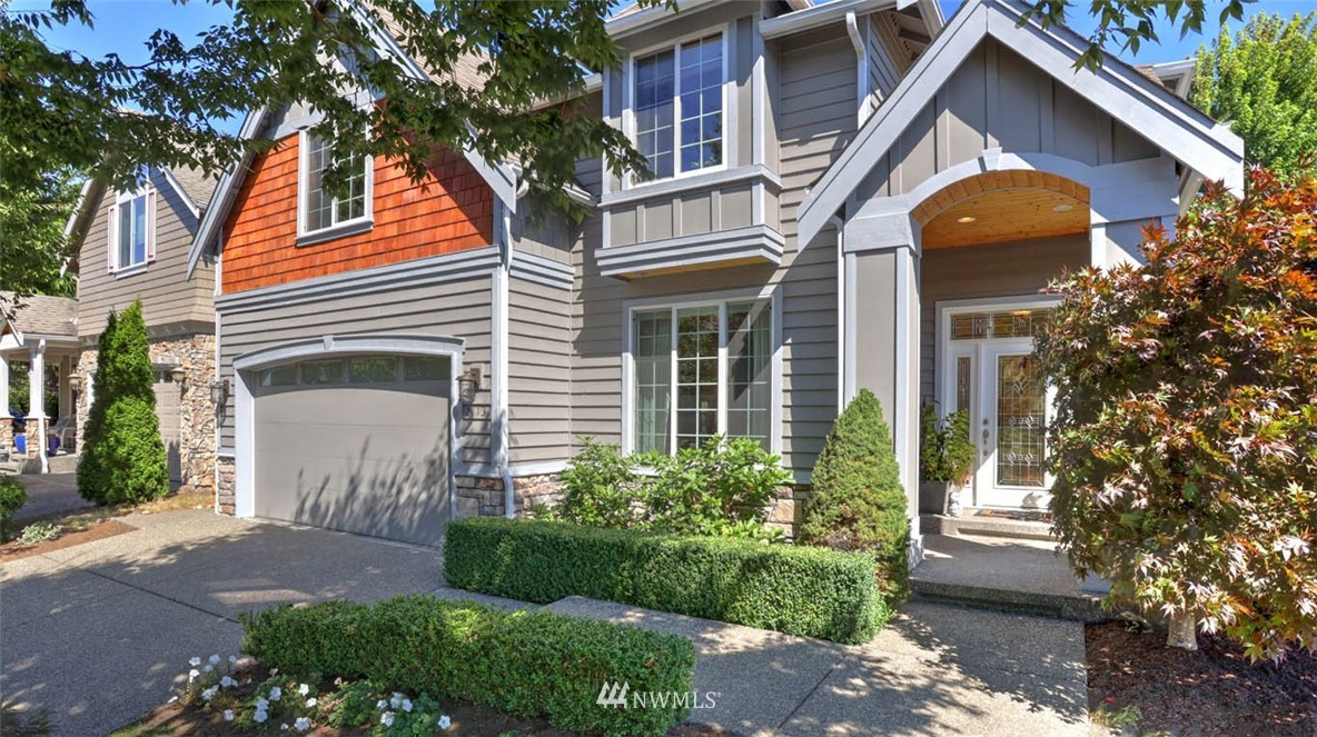 21131 37th Avenue Southeast Bothell, WA 98021 - Photo 1 of 40 a front view of a house with garden